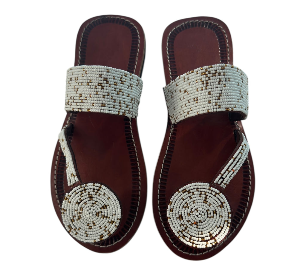 The Naserian Sandal – White & Gold Maasai Beaded Leather Sandals for Women.