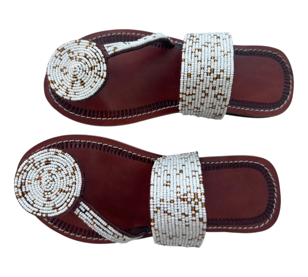 The Naserian Sandal – White & Gold Maasai Beaded Leather Sandals for Women.