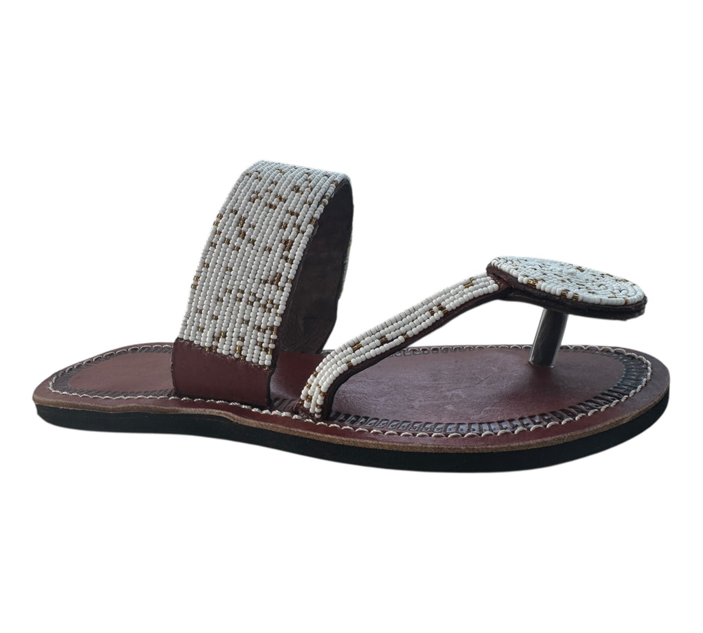 The Naserian Sandal – White & Gold Maasai Beaded Leather Sandals for Women.