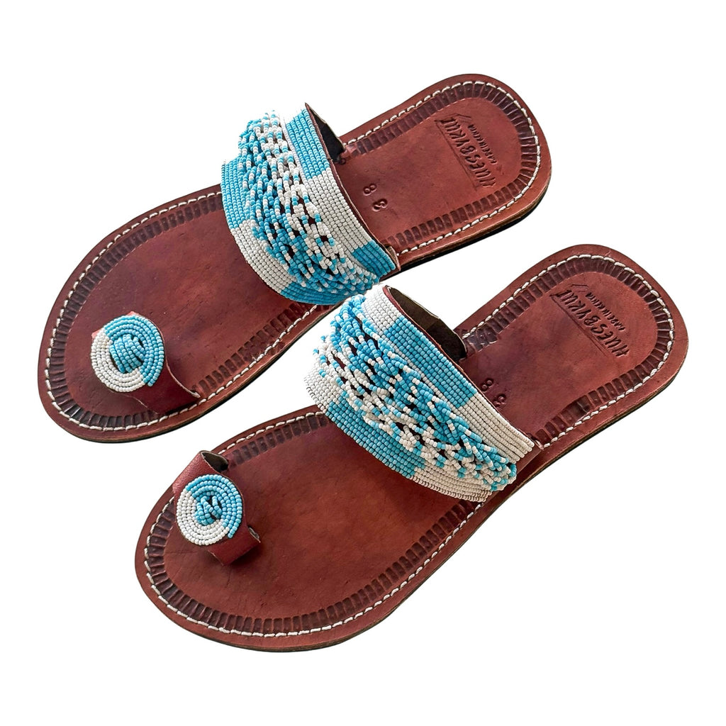 Bahari beaded leather sandals featuring soft turquoise detail on genuine brown leather
