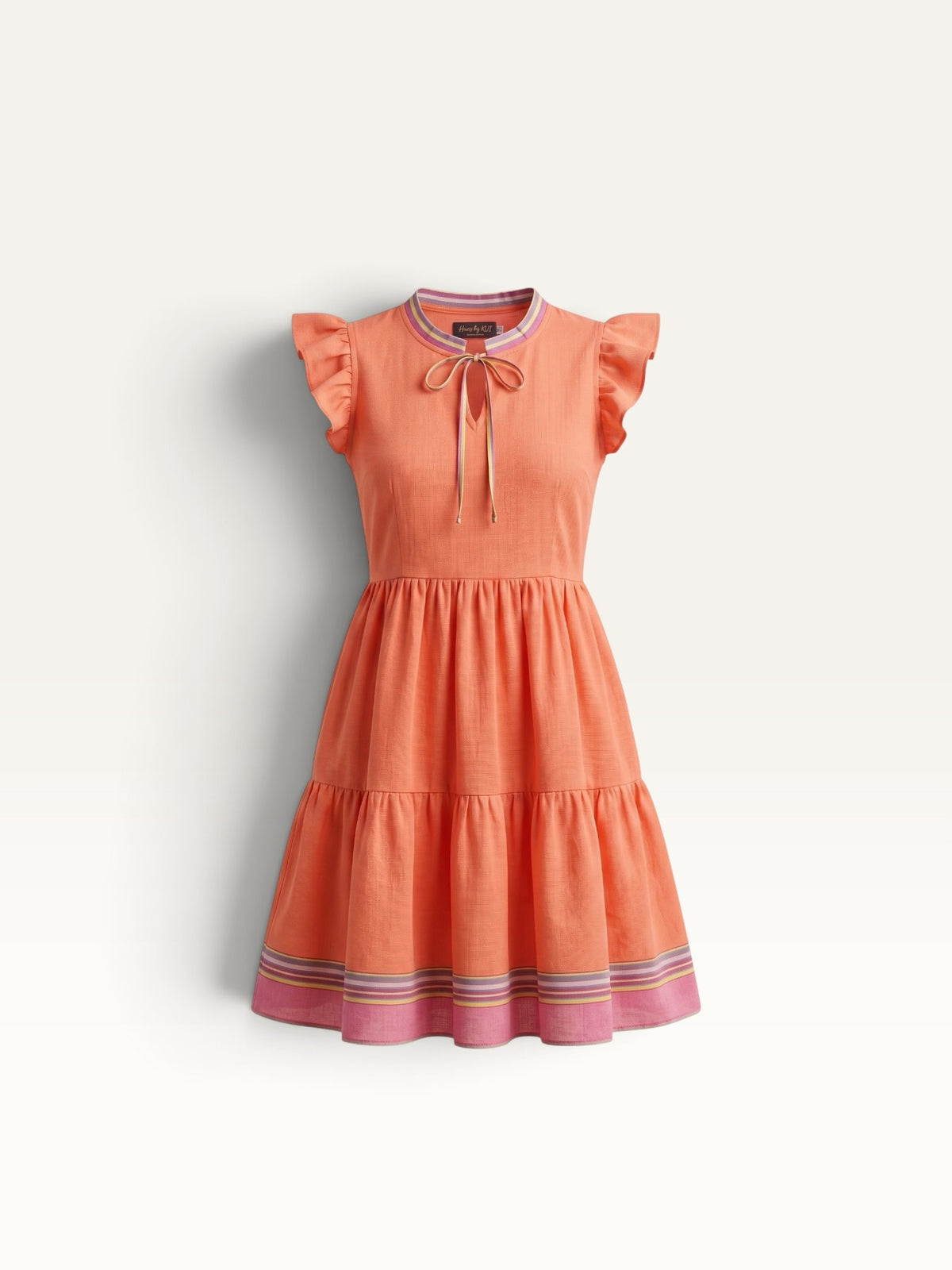 Hues by Kui coral tiered midi dress with flutter sleeves, tie-neck detail, and colourful striped trim accents.