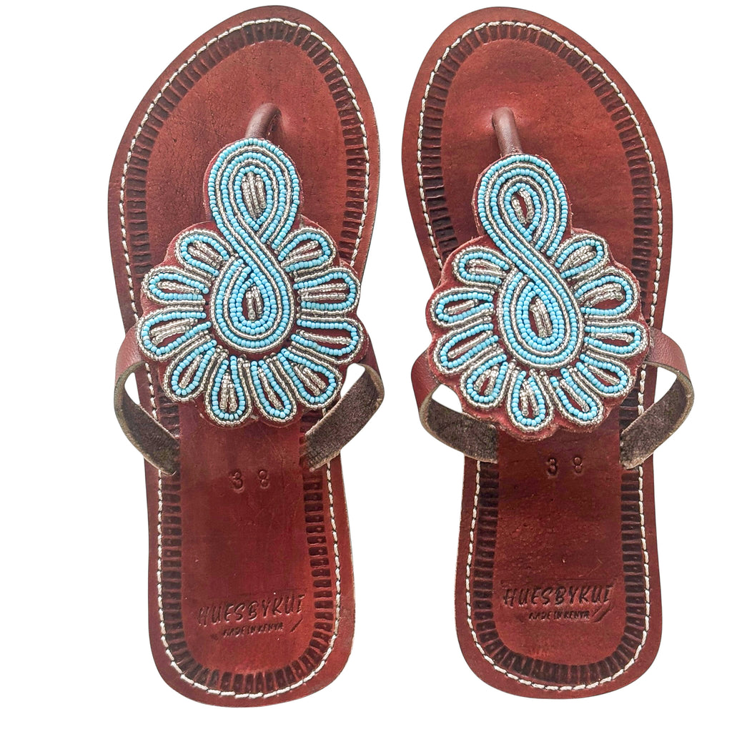 Enkai handmade brown leather sandals with turquoise floral beadwork by Hues by Kui