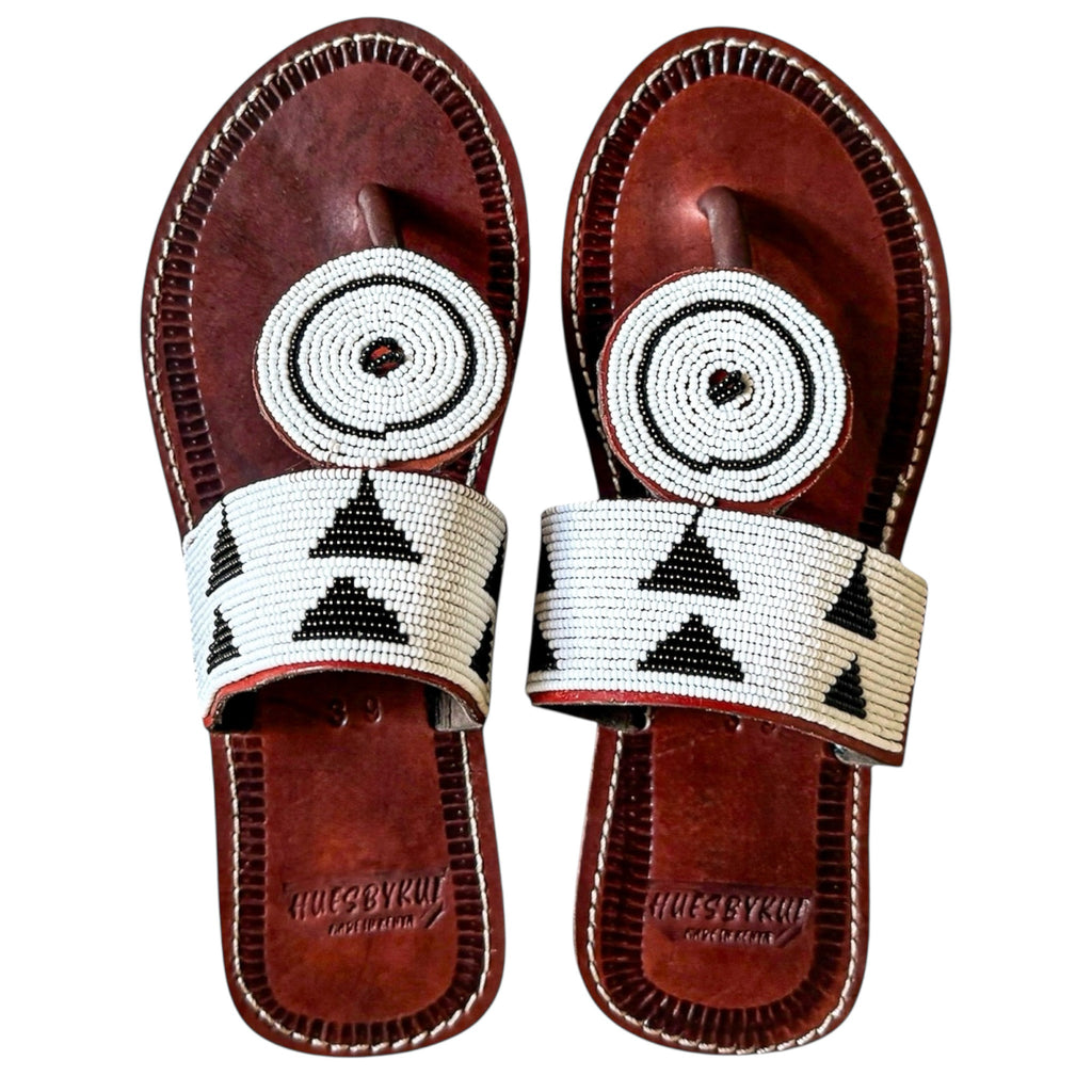 Nabo handmade brown leather sandals with black and white beaded design by Hues by Kui