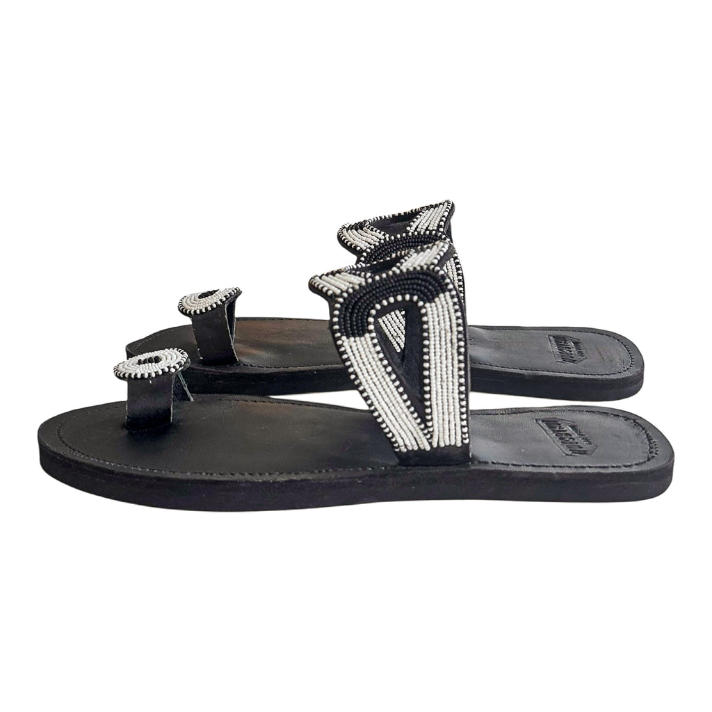 Side view of Nala handcrafted leather sandals with geometric beadwork