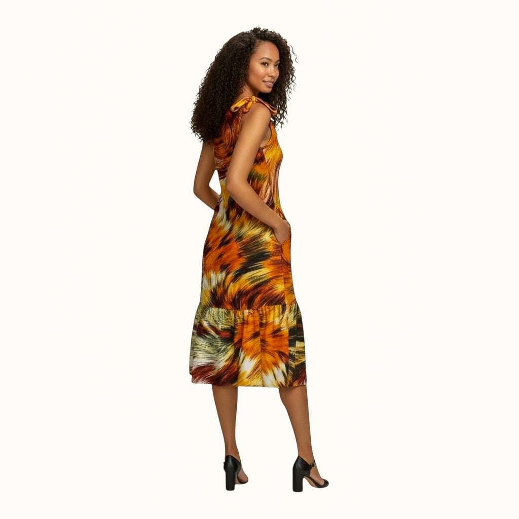 Woman wearing African print midi dress
