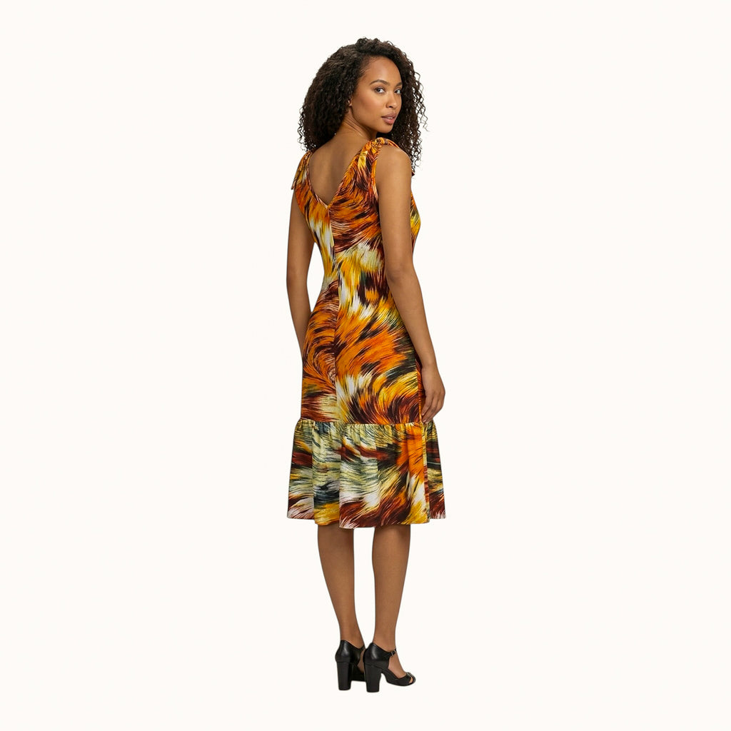 Back view of African print cotton midi dress by Hues by Kui