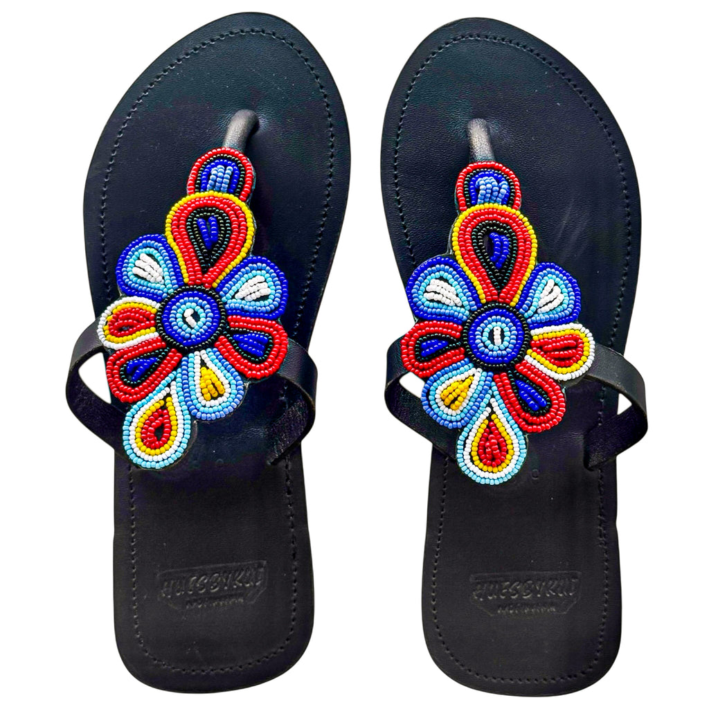 Tausi handmade black leather sandals with vibrant floral beadwork by Hues by Kui
