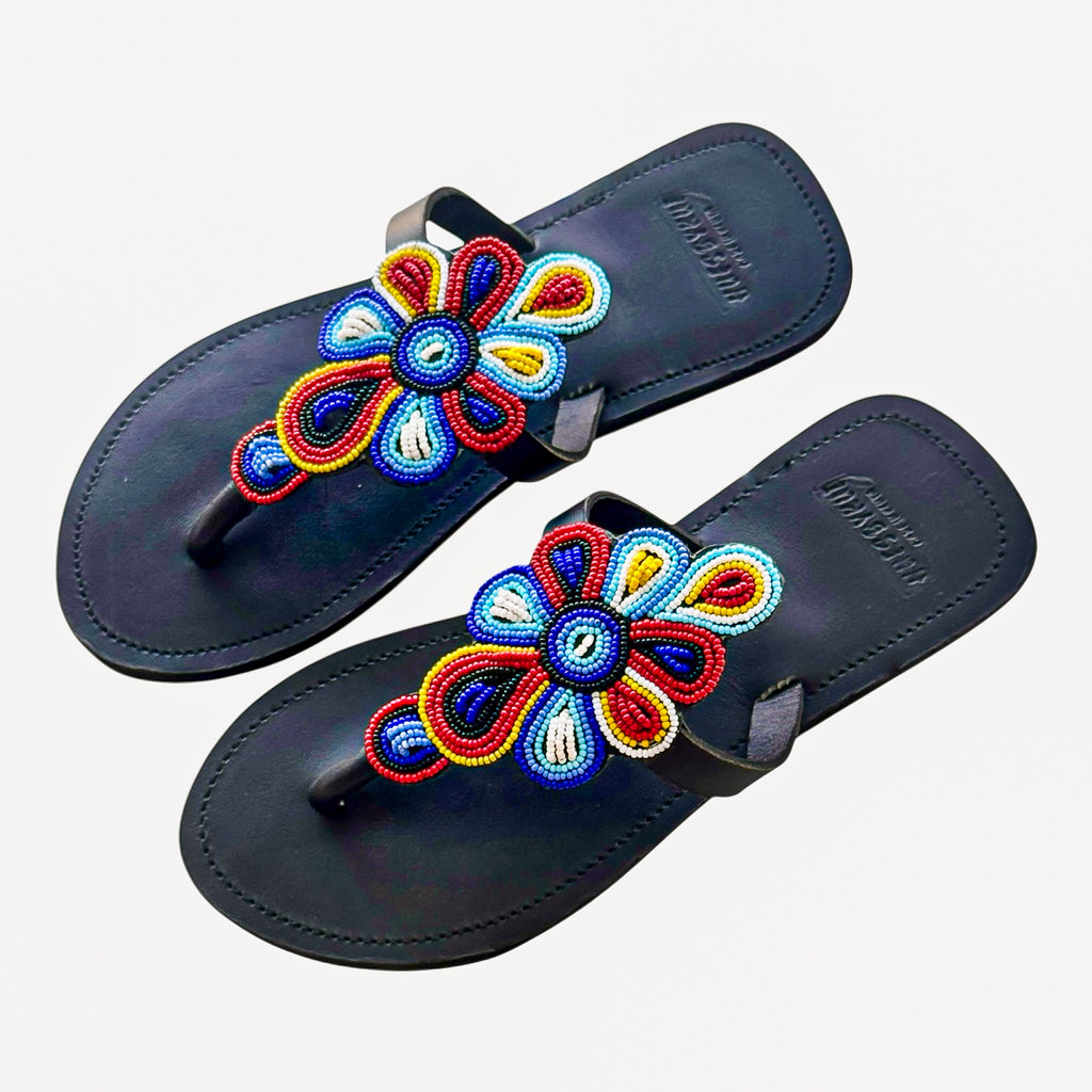 Black leather beaded sandals featuring multicolor floral design – Tausi by Hues by Kui
